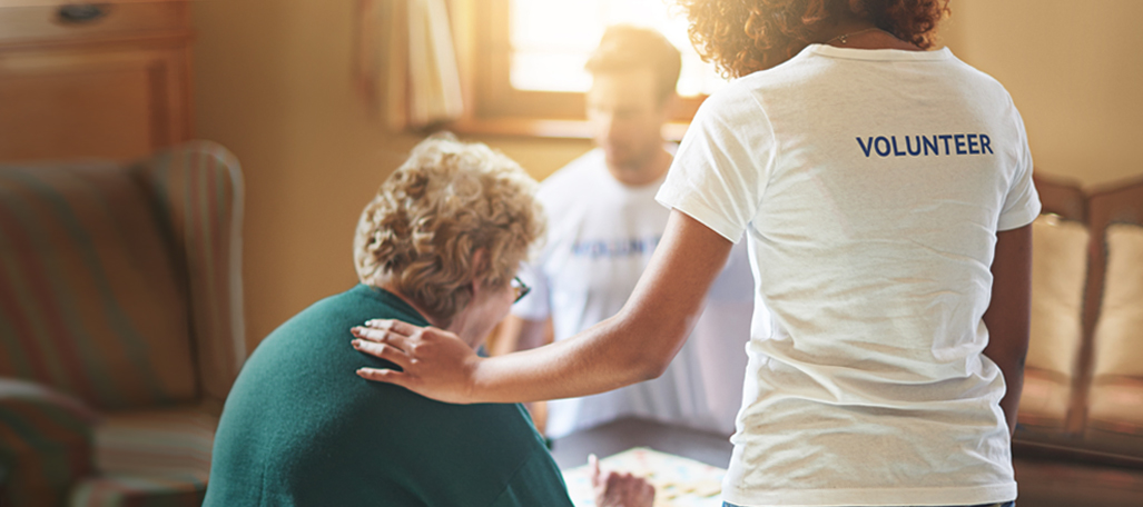 A volunteer with a senior citizen.